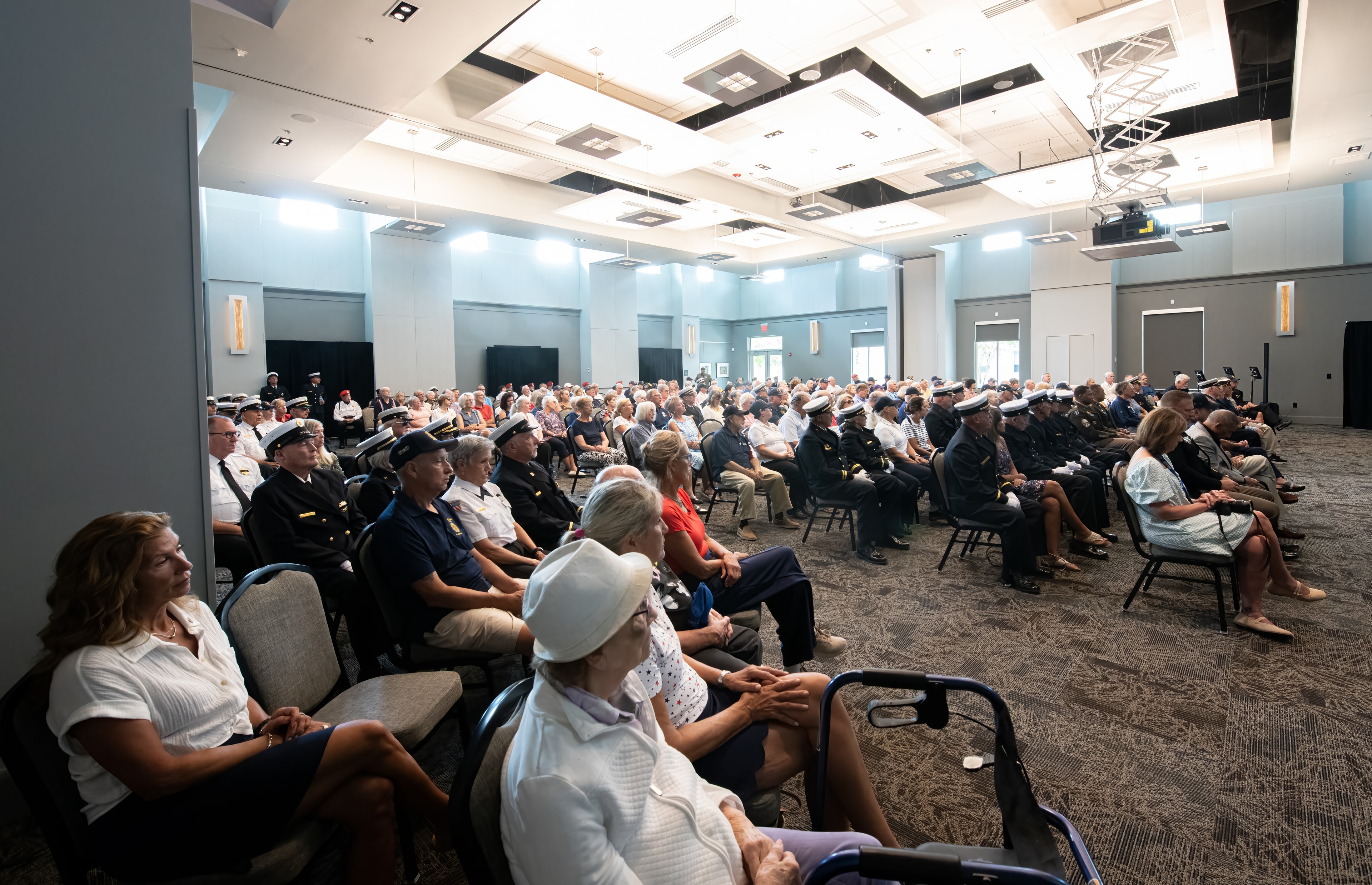Attendees seated at the 25th Anniversary 9/11 Remembrance Ceremony at the Homer E. Wright Event Center