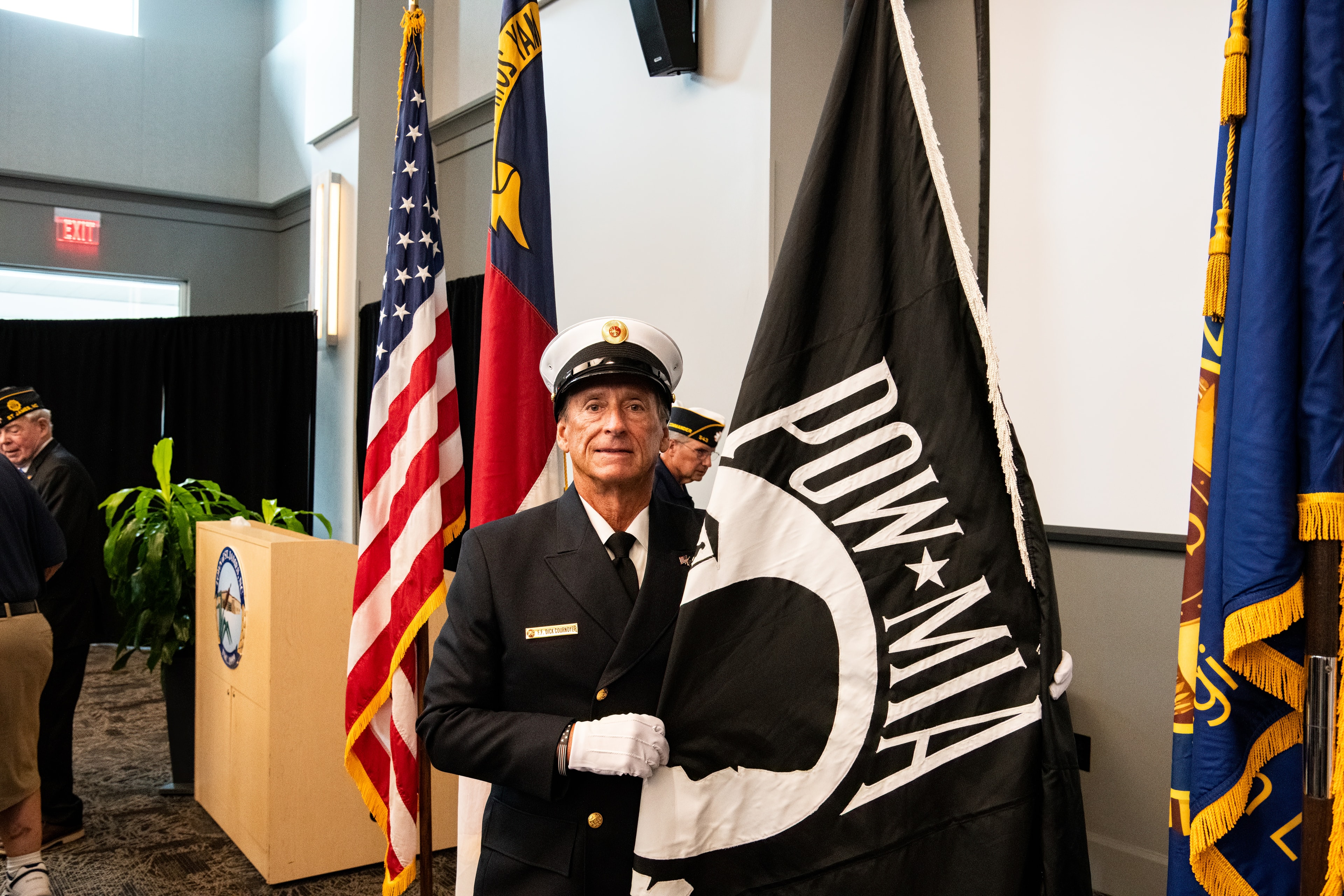 SJFD officer carrying the POW/MIA flag during the color guard presentation at the 9/11 Remembrance Ceremony