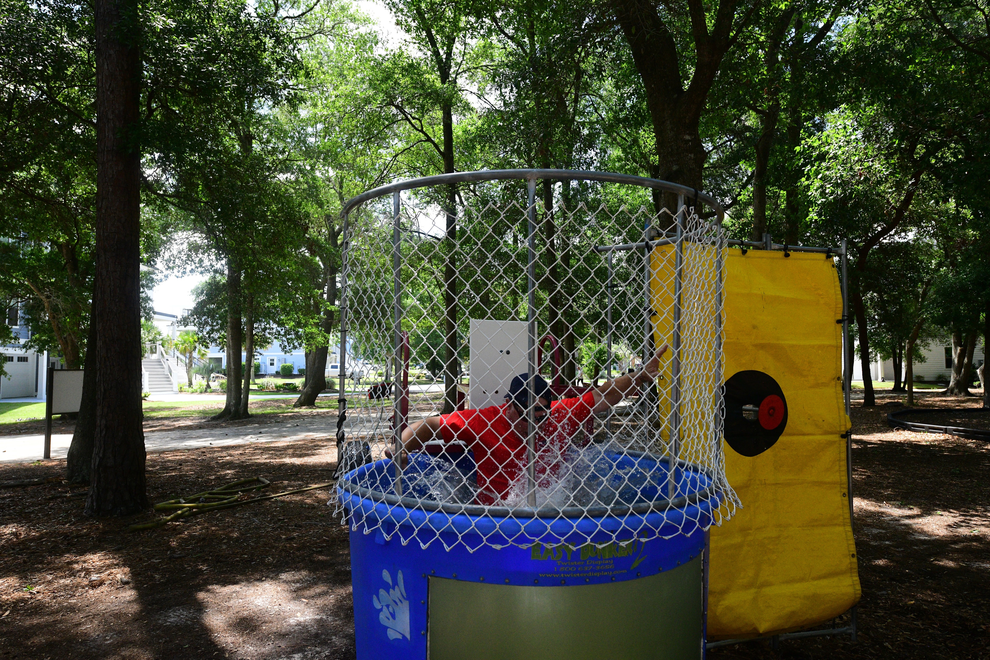 Officer splashing into the dunk tank at the 3rd Annual SJFD Volunteer Appreciation Picnic