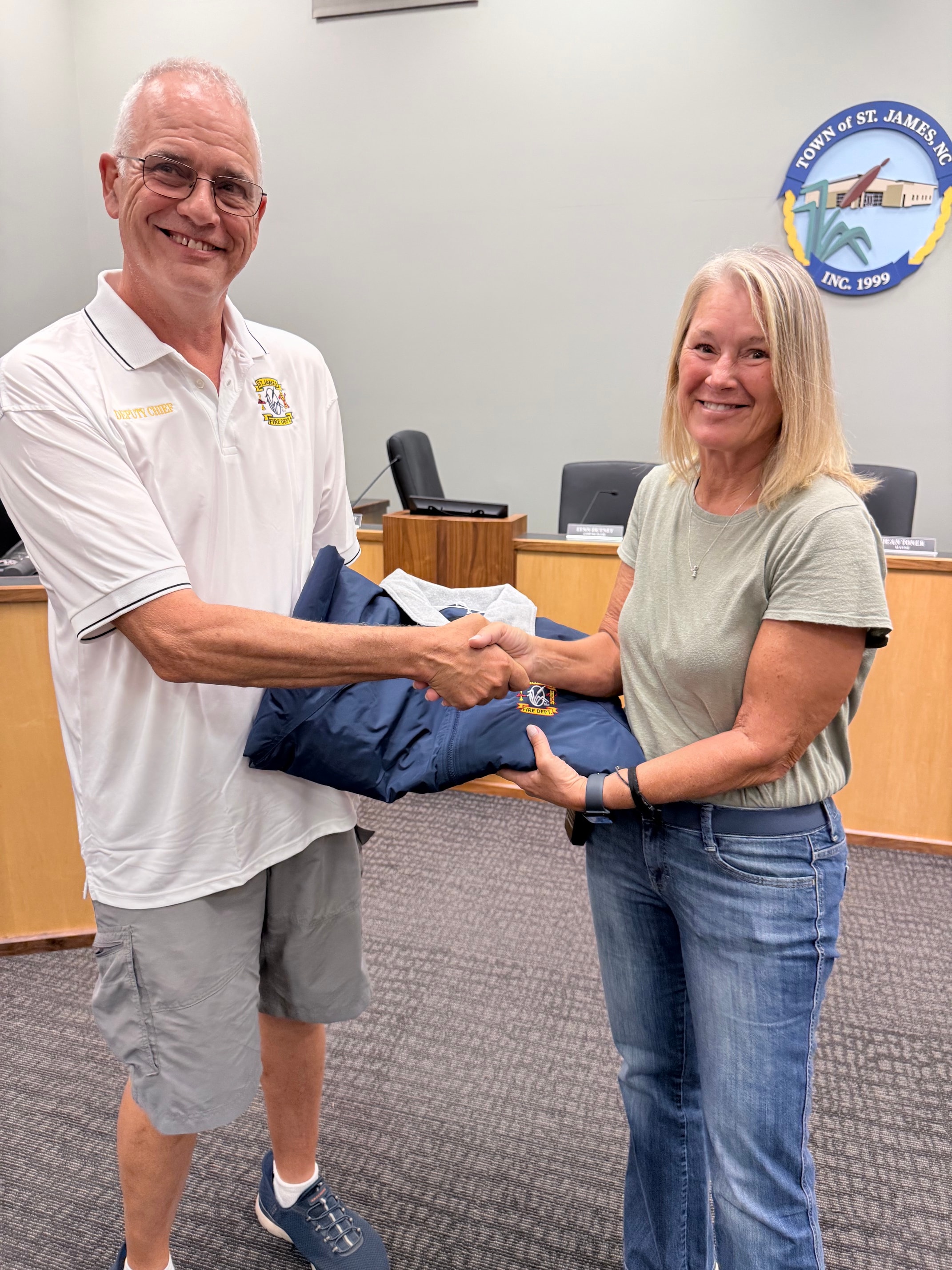 Brenda Fairchild receiving her 1-year service award