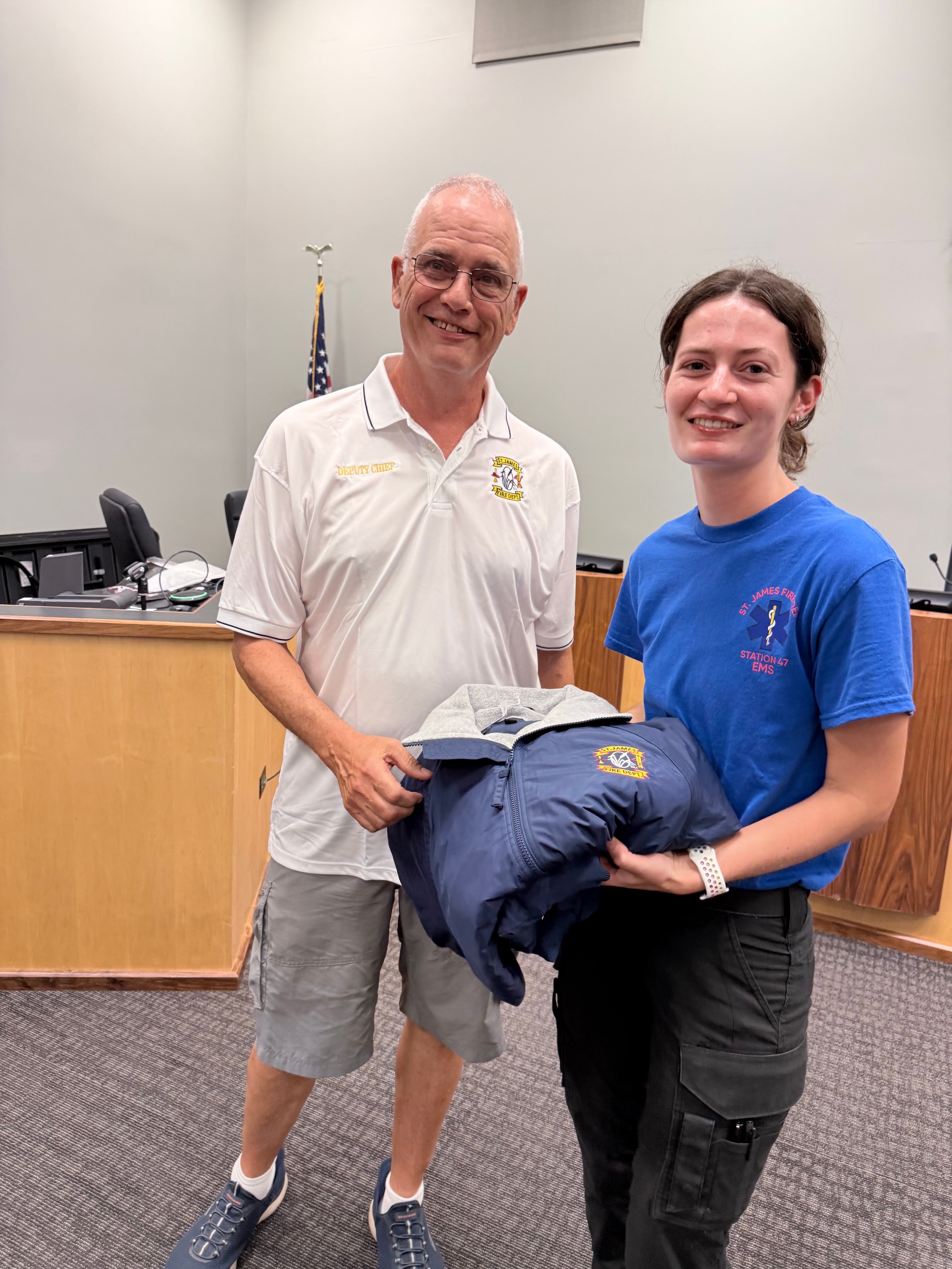 Katie Piotrzkowski receiving her 1-year service award